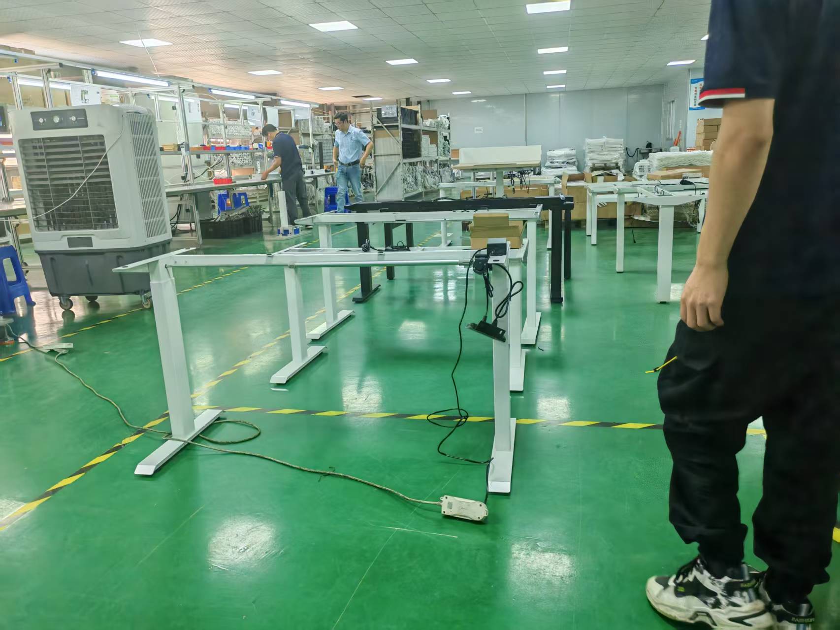 Tikslumas judesyje: kodėl „Huagang“ elektriniai stovinčio stalo rėmai užtikrina stabilumą